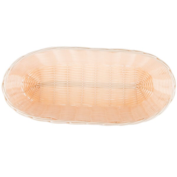 A close-up of a Tablecraft woven rattan-like bread basket.