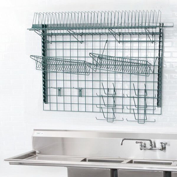 A Metro SmartWall G3 Dish Wash Task Station with a stainless steel sink and a wall shelf.