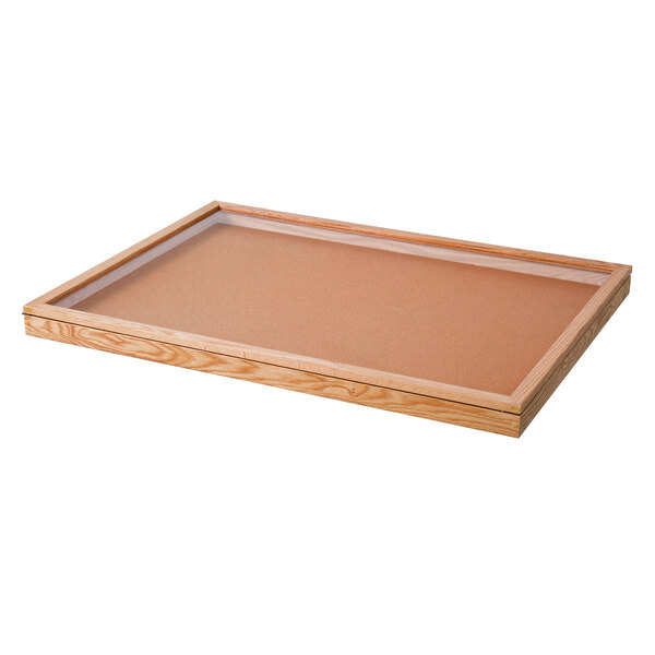 A wooden board with a glass top.