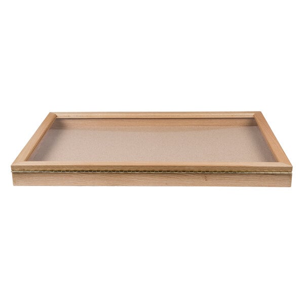 A wooden frame with a clear glass top.