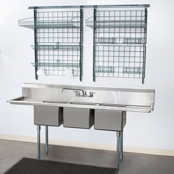 A Metro SmartWall G3 dish wash task station with four wall grids and wall track above a stainless steel sink.