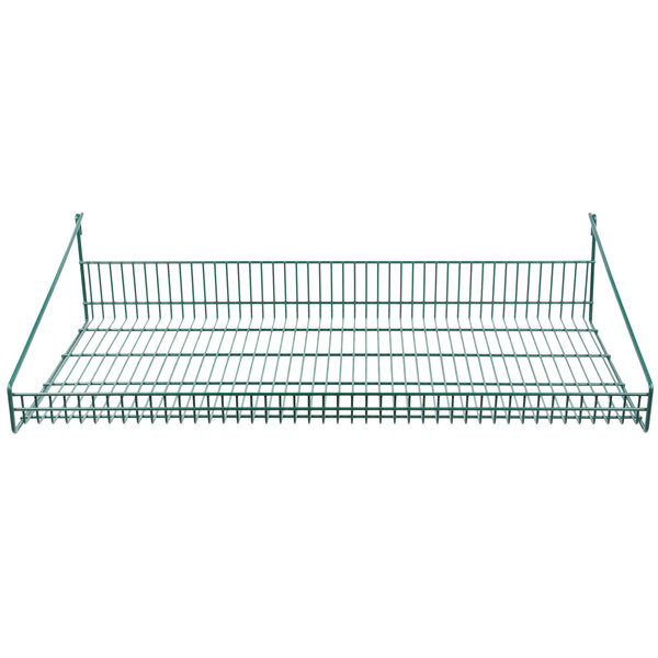 A green wire rack and shelf on a green metal grid.