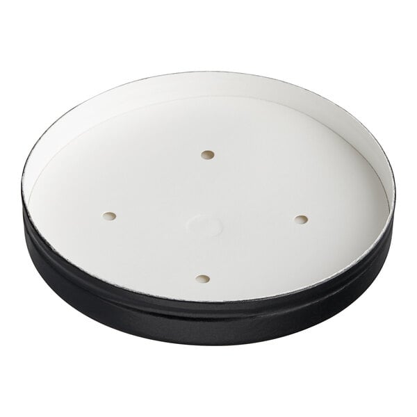 A round black container with a white vented lid.
