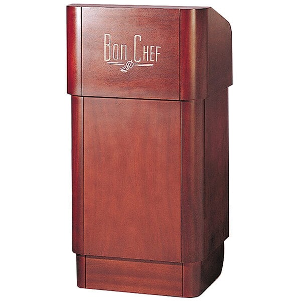 A Bon Chef walnut mahogany podium with a logo.