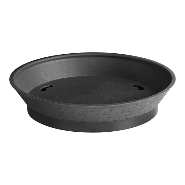 A black round plastic platter with a base.