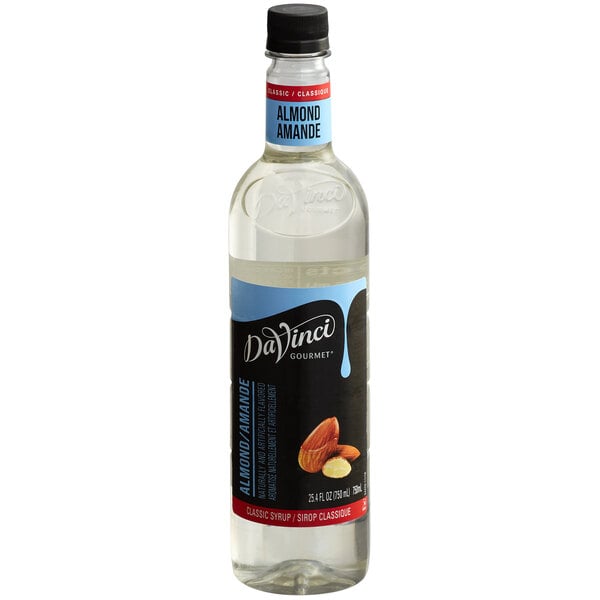 A close up of a bottle of DaVinci Gourmet Classic Almond Flavoring Syrup.
