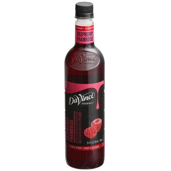 A close up of a DaVinci Gourmet Classic Raspberry Flavoring syrup bottle.