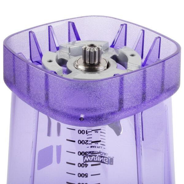The Raptor purple plastic blender jar for commercial blenders with a metal lid.