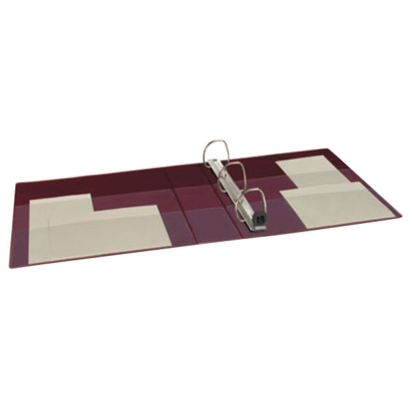 An Avery maroon heavy-duty binder with 2" locking One Touch EZD rings holding a piece of paper.