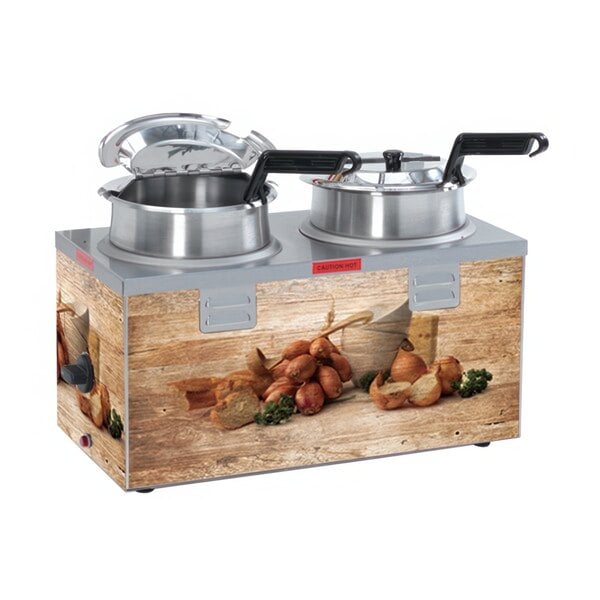 A Nemco Triple Well soup warmer with 4 pots inside.