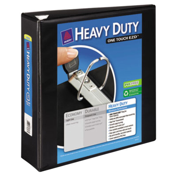 A black Avery heavy-duty ring binder on a counter.