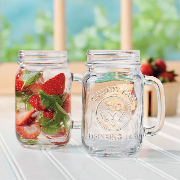 ANOTION Mason Jar Drinking Glasses - 16oz Mason Jars Glass Cups With Lids  and Straws Iced Coffee Cup…See more ANOTION Mason Jar Drinking Glasses 