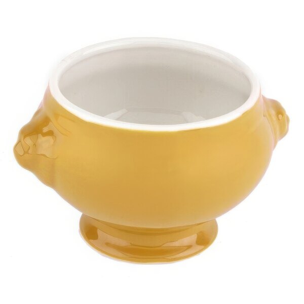 A yellow porcelain lion head bouillon bowl with a white rim and handle.