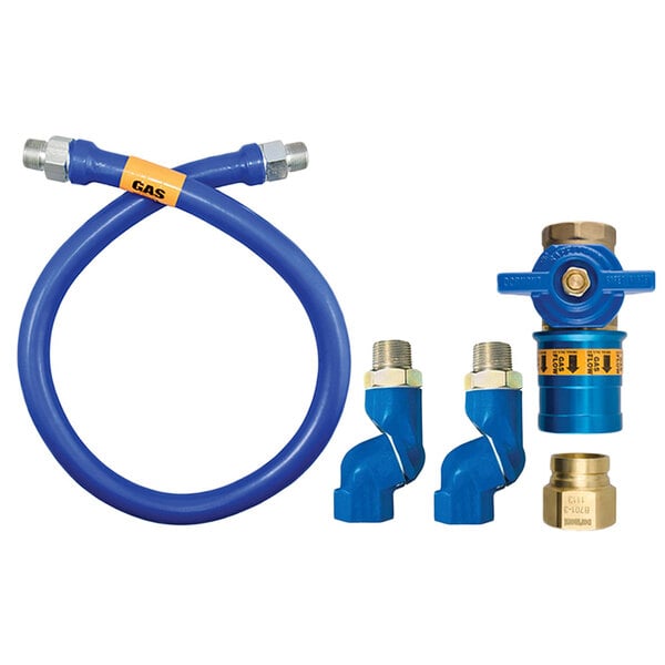 A close-up of a blue Dormont gas connector hose with yellow fittings and a yellow label.