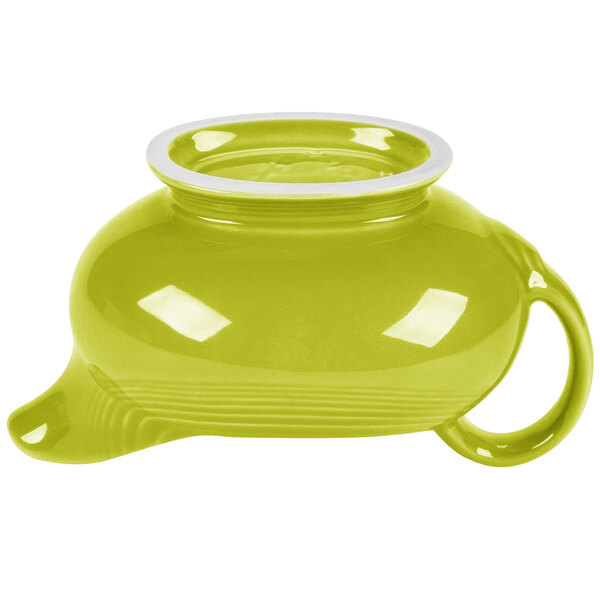 A Fiesta lemongrass gravy boat with a white rim.