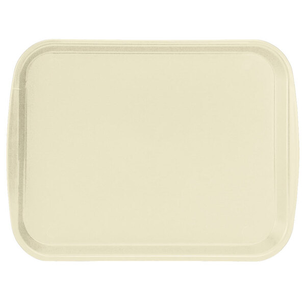 A beige rectangular Vollrath plastic tray with built-in handles.