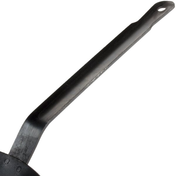 A black metal spatula with a black handle and a hole in the end.