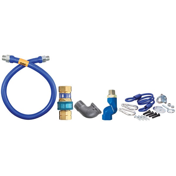 A blue Dormont gas connector kit with fittings and a restraining cable.