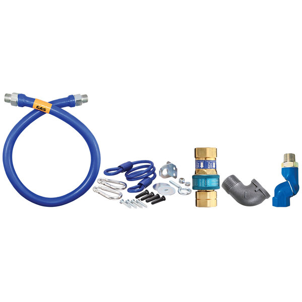 A blue Dormont gas connector hose kit with fittings and a restraining cable.