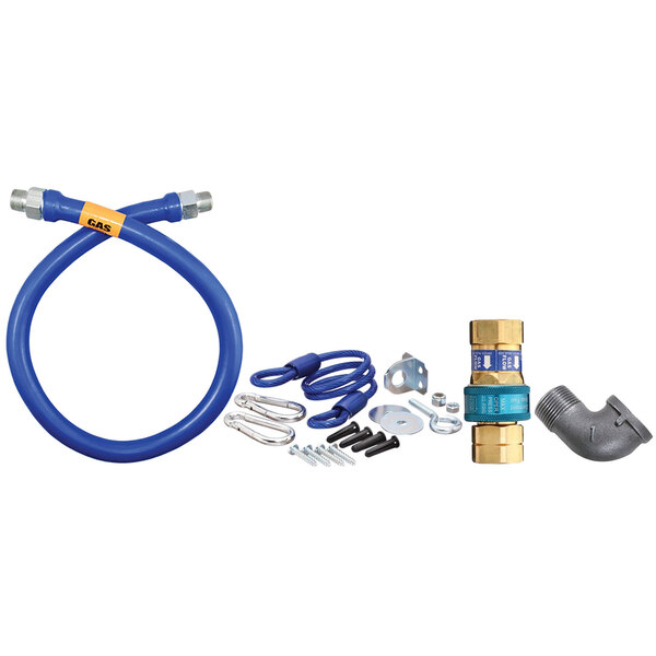 A blue Dormont gas connector kit with parts and a restraining cable.