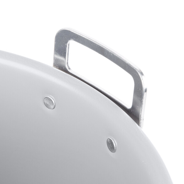 An aluminum rice cooker pot with a lid.