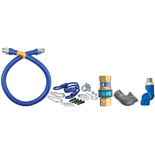 A blue Dormont gas connector hose kit with fittings and a restraining cable.