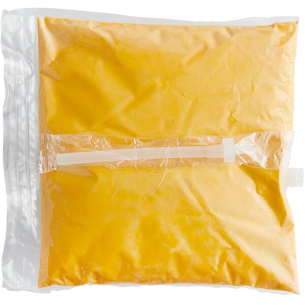A plastic bag of yellow liquid with a yellow and white patterned label.
