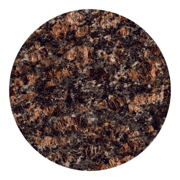 A round tan brown granite tabletop with black and brown speckles.