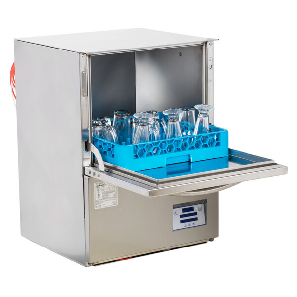 A stainless steel undercounter dishwasher with a blue rack holding glassware and a digital control panel on the front.