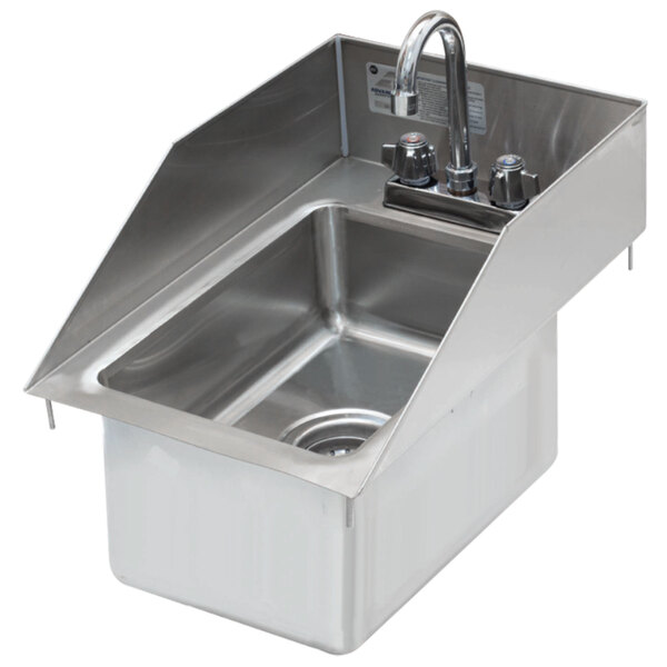 A stainless steel Advance Tabco drop-in sink with a faucet.