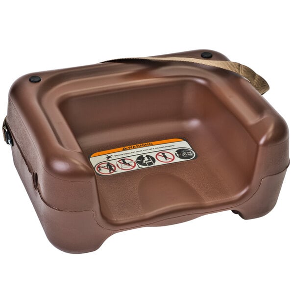 A brown plastic Koala Kare booster seat with a safety strap.