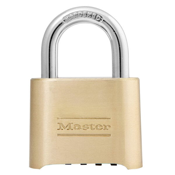A close up of a Master Lock brass combination padlock.