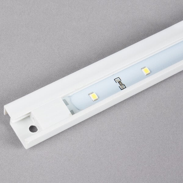 An Avantco LED light bulb with a hole in the middle.