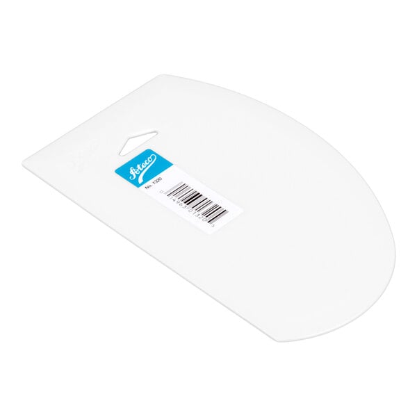 A white, flat, semi-circular plastic tool with a barcode sticker on its surface.