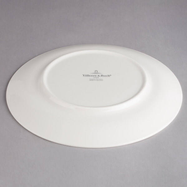 A white Villeroy & Boch porcelain plate with a white rim.