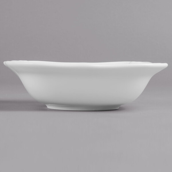 A close-up of a Villeroy & Boch white porcelain square salad bowl.