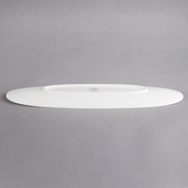 A white porcelain Villeroy & Boch gourmet boat on a gray surface.