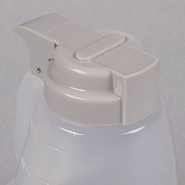 A Tablecraft plastic dispenser jar with a colored lid.