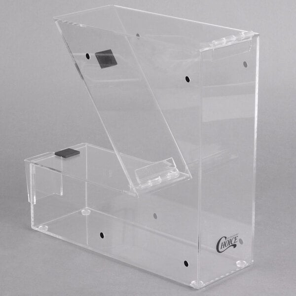 A clear plastic stackable candy dispenser with a lid.