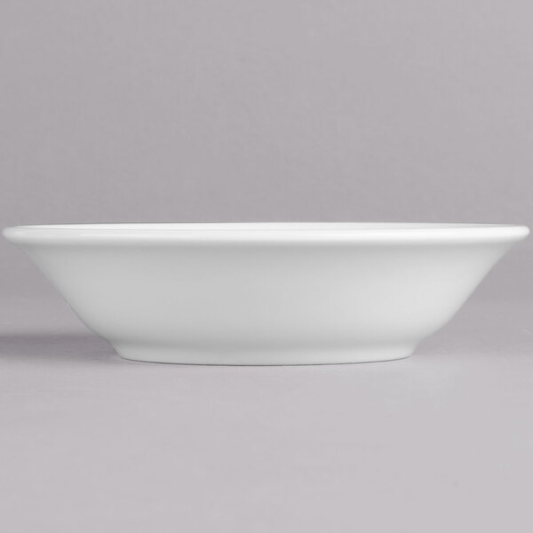 A white Villeroy & Boch Corpo porcelain bowl on a gray surface.