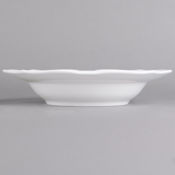 A white Villeroy & Boch porcelain soup plate with a rippled edge.