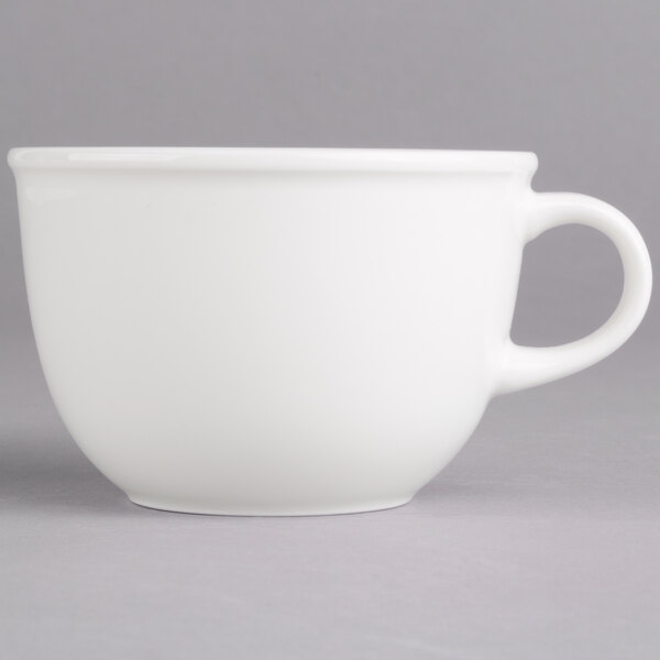 A Villeroy & Boch white porcelain cup with a handle.