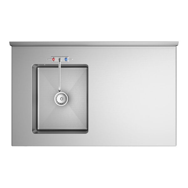 A stainless steel work table with an integrated sink and faucet positioned on the left side.