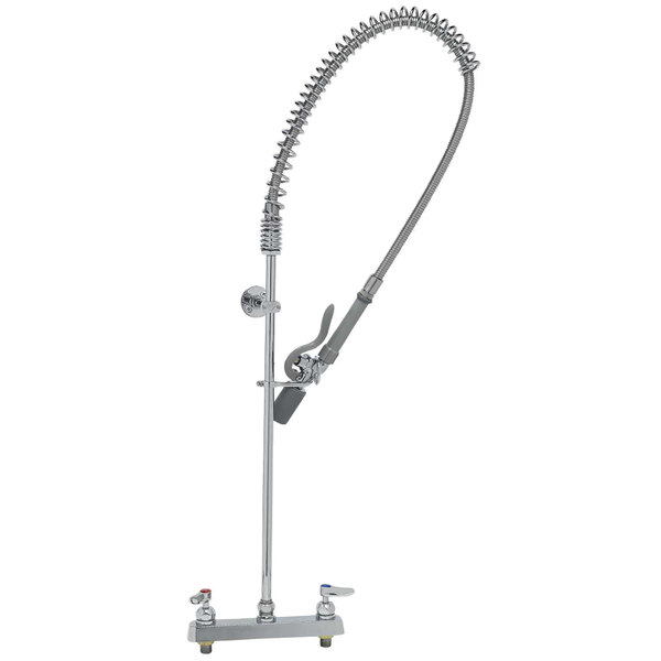 A T&S stainless steel pre-rinse faucet with a hose attached to it.