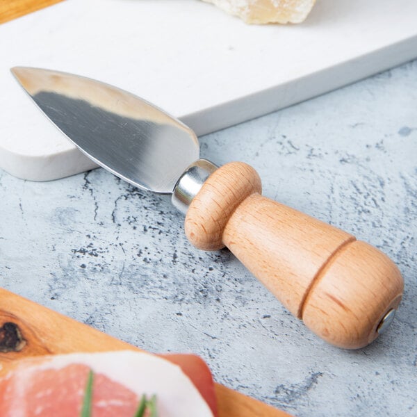 A Franmara stainless steel hard cheese knife with a beechwood handle.