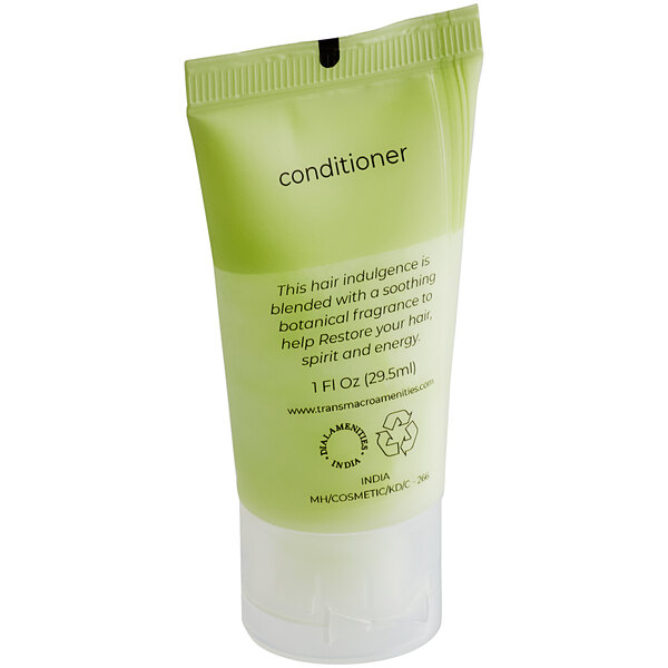 A green bottle of Dial Restore Conditioner with black text.