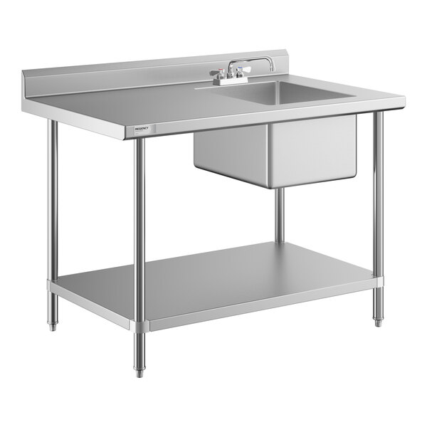 A stainless steel work table with a sink and faucet on the right side, featuring an undershelf and four legs.