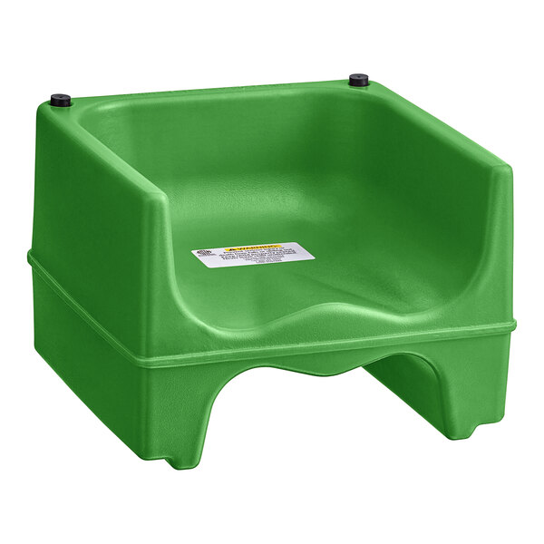 A green plastic Lancaster Table & Seating dual height booster seat with a black handle.