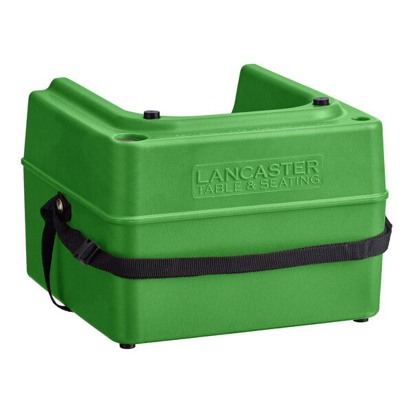 A green plastic Lancaster Table & Seating dual height booster seat with a black strap.
