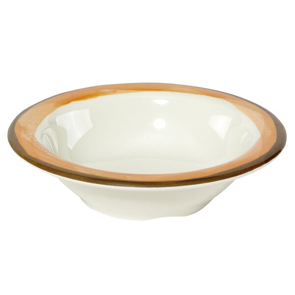 A white bowl with a brown rim and orange edge.